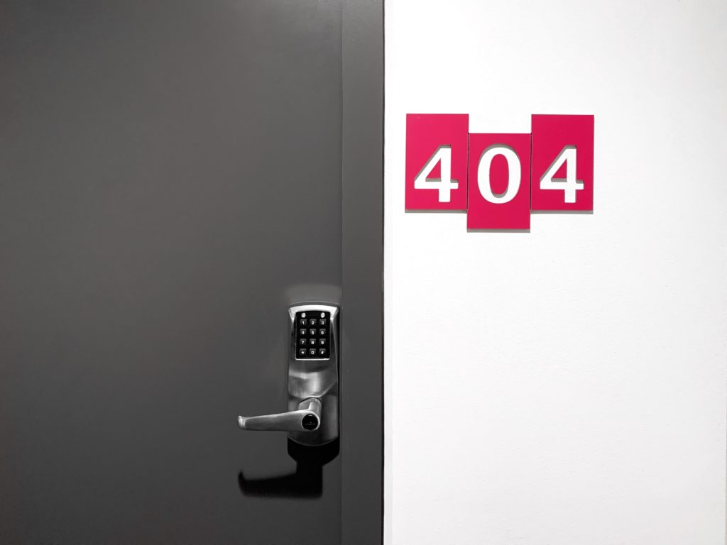 404 message beside a locked door